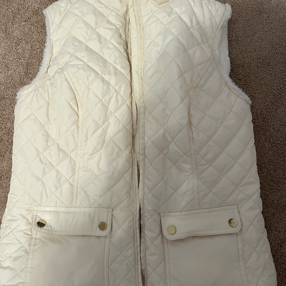 Off white / cream colored vest. Fuzzy and soft on the inside. Size medium.